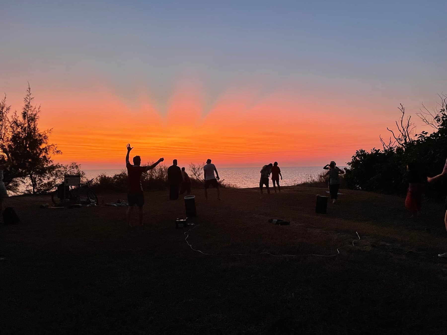 Joyful Freedom free-dance community moving together beside the sea